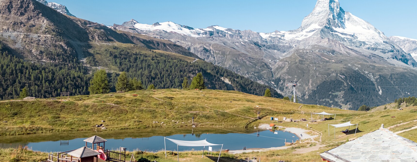 Il Parco Avventura Wolli al Lago Leisee con parco giochi e vista perfetta sul Cervino.  | © Basic Home Production