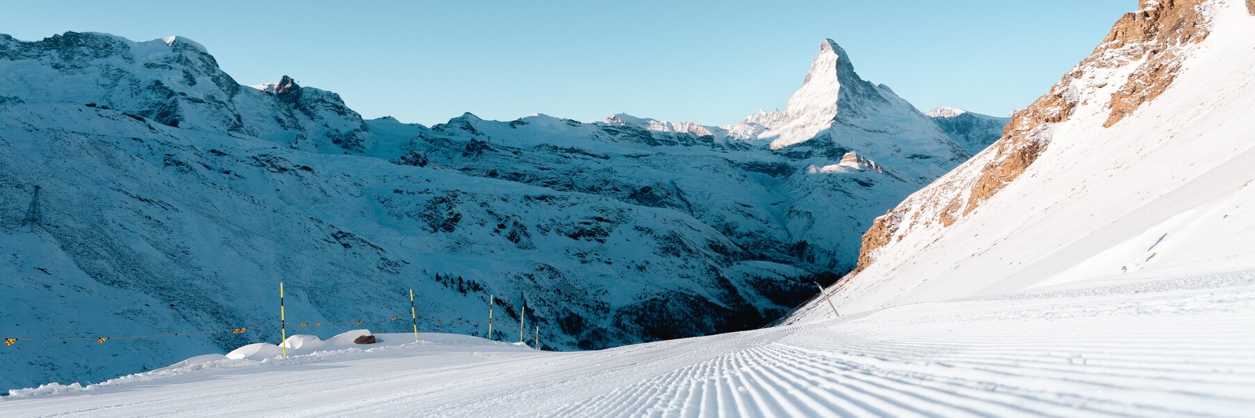 Freshly groomed Rotweng piste with the Matterhorn in the background | © Christian Bürgi