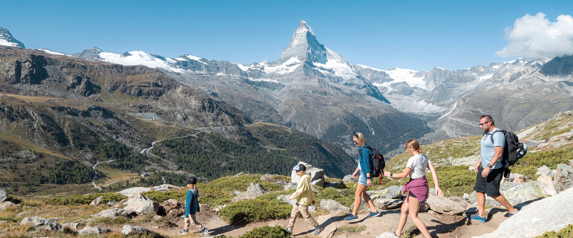 A family hikes amidst the fauna and flora of Zermatt | © Basic Home Production 