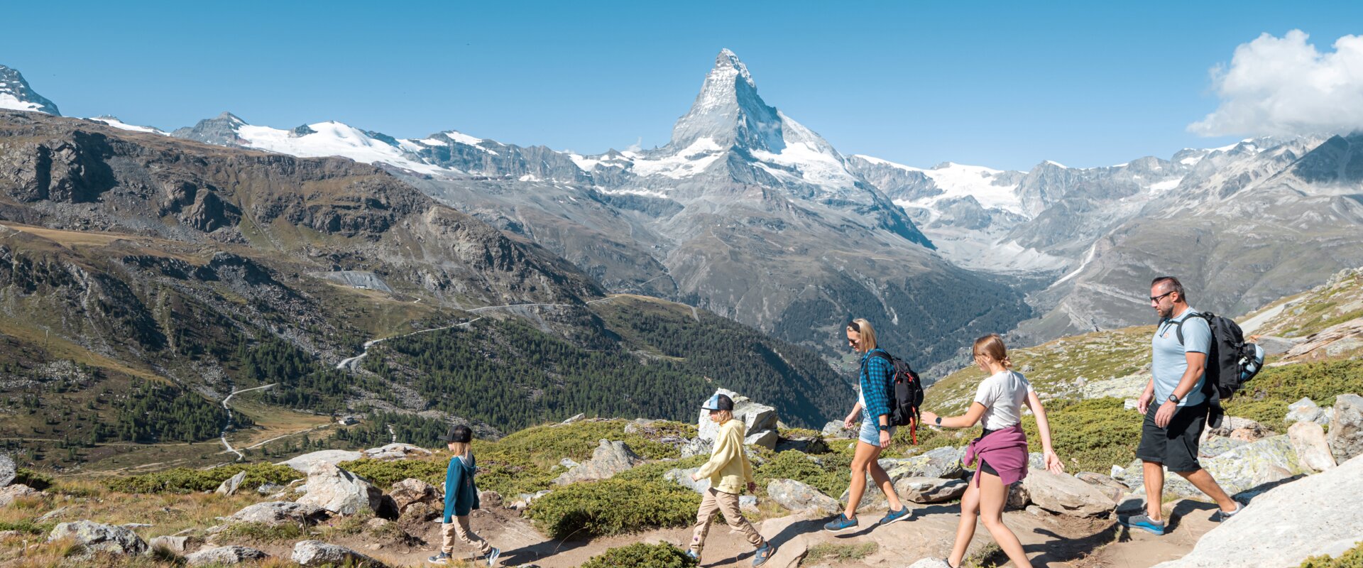 A family hikes amidst the fauna and flora of Zermatt | © Basic Home Production 